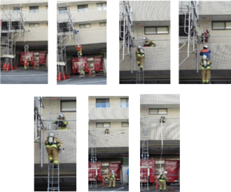 はしごを使って救助する訓練写真